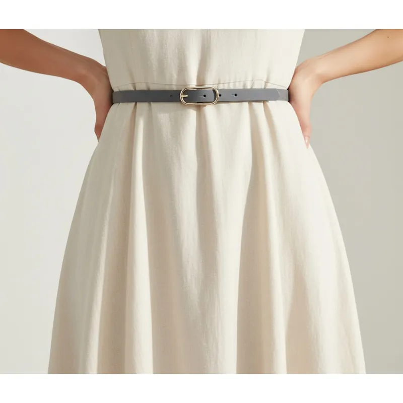 Damengürtel als Taillengürtel über Kleid – Silhouette betonen