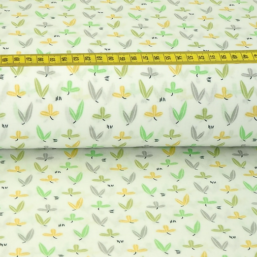 Baumwolle Bunte Blätter mit Gelb auf Cremeweiß Baumwolle Bunte Blätter mit Gelb auf Cremeweiß