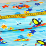 Baumwolle Tiere auf Surfbrett Hellblau Überbreite