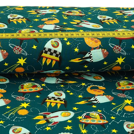 Baumwolle Space Dinos auf Petrol Überbreite