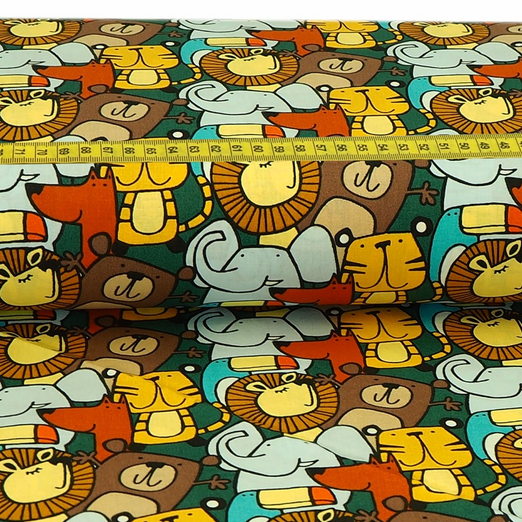 Baumwolle Tiergesichter auf Dunkelgrün Überbreite Baumwolle Tiergesichter auf Dunkelgrün Überbreite