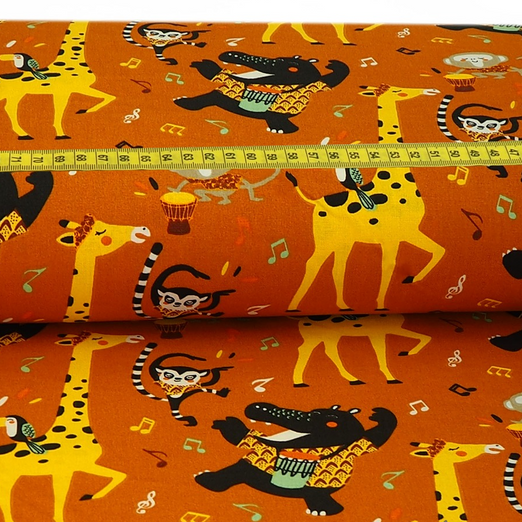 Baumwolle Dancing Animals auf Dunklem Orange Überbreite Baumwolle Dancing Animals auf Dunklem Orange Überbreite