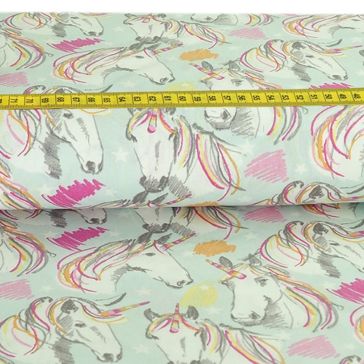 Baumwolle Einhornportraits auf Hellmint Überbreite