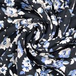 Quiltet jakke-stof – viskose blomster sort blå