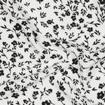 Tecido para blusas e vestidos – Stretch flores pequenas branco e preto