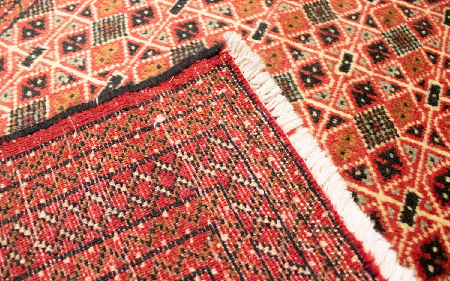 Turkamanský koberec - 130 x 60 cm - světle červená