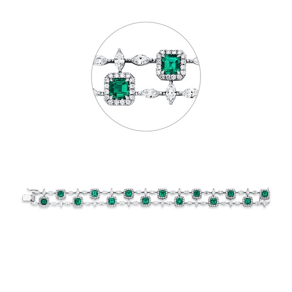 Armband aus 750 Weißgold 14 Smaragde 266 Brillanten 5.22ct