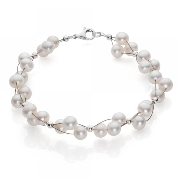 Armband aus Perlen creme-weiß 3-reihig