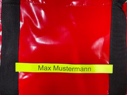 Klettschild mit Beschriftung für Fenomed Bekleidungstasche