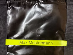 Klettschild mit Beschriftung für Fenomed Bekleidungstasche