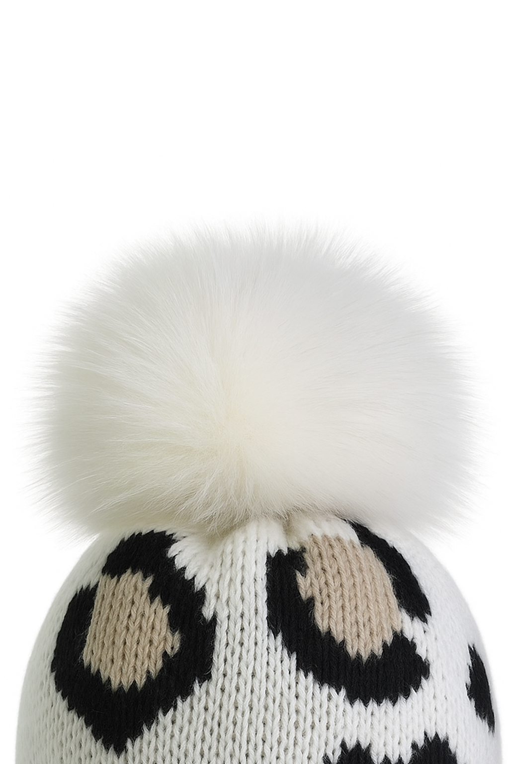 Modische Strickmütze mit Bommel für kalte Tage Modische Strickmütze mit Bommel für kalte Tage