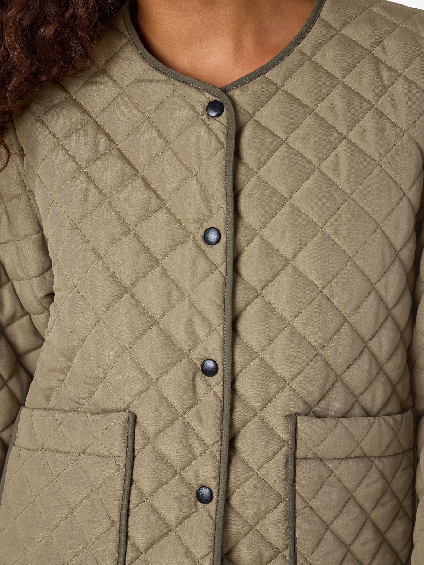 27035996_4902660_6.jpg Leichte Steppjacke kariert mit Druckknöpfen