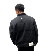 Chaqueta ligera Rough Over de entretiempo, con logo en la espalda y cuello de pana, negra.