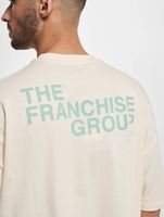 T-shirt d'entreprise de franchise crème T-shirt d'entreprise de franchise crème