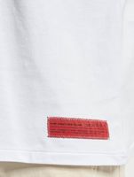 The Couture Club pocket cutout T-shirt in white
