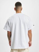 The Couture Club pocket cutout T-shirt in white