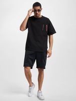 T-shirt ample The Couture Club avec détail de poche en noir T-shirt ample The Couture Club avec détail de poche en noir
