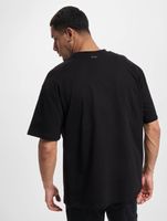 T-shirt ample The Couture Club avec détail de poche en noir T-shirt ample The Couture Club avec détail de poche en noir