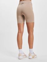 The Couture Club cycling shorts with graphic label and detail in beige