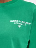 Camisetas de algodón relajadas con el logotipo de la temporada de The Couture Club en verde
