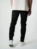 Vaqueros básicos premium ajustados UNEFFECTED para hombre, negros