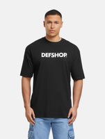 DEF MERCH souvenir T-shirts with a large brand print, round neck, in black, beige, or camouflage DEF MERCH souvenir T-shirts with a large brand print, round neck, in black, beige, or camouflage