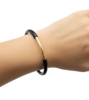 Moderner Calvin Klein Damen Armreif schwarzes Armband mit goldfarbenem Mittelsteg Arm-Schmuck KJ5FBF2001 Schwarz/Gold