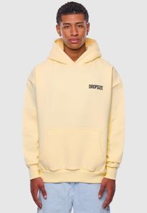 Sweat à capuche oversize pour homme, coupe ample, en coton jaune.