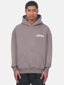 Sudadera con capucha suave de corte holgado para hombre, confeccionada en algodón, color beige.