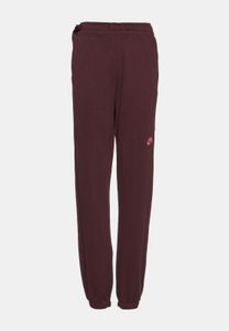 Pantalones versátiles de mujer NIKE de algodón, color rojo burdeos.