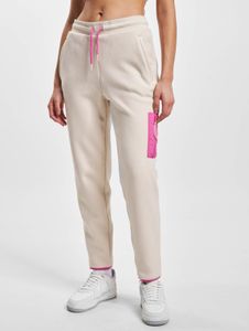 Vaqueros Tommy Jeans elegantes para mujer con cremallera, color beige.