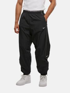 Pantalones vaqueros modernos de hombre NIKE con bolsillos con cremallera, color negro/blanco.