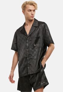 Polo stretch moderne Karl Kani pour homme, noir