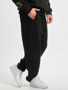 Comfortable URBAN CLASSICS men's trousers with pockets, ribbed cuffs, 380 g/m² cotton, black