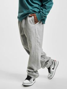 Versatile URBAN CLASSICS men's trousers with drawstring and pockets, 380 g/m² cotton, grey