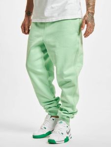 Stylish Urban Classics men's jeans with drawstring pockets, 300 g/m² cotton, pastel green