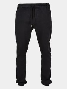 Modern URBAN CLASSICS men's jeans with stretch, drawstring, and pockets, made of cotton, black