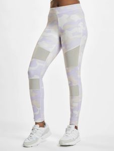 Versatile Urban Classics women's trousers with stretch fabric, pockets, mesh, and camouflage