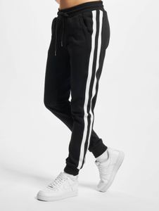 Pantalones versátiles de Urban Classics para mujer con cordón ajustable y bolsillos, algodón de 300 g/m², color negro.