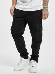 Comfortable URBAN CLASSICS men's stretch jeans with zip pockets, cotton, black