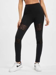 Pantaloni casual da donna Urban Classics, in rete elasticizzata, con stampa leopardata e fodera in cotone, colore nero.