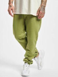 Pantalones vaqueros Urban Classics cómodos para hombre con cordón ajustable y bolsillos, 300 g/m², color verde.