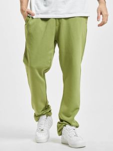 Pantalones vaqueros Urban Classics cómodos para hombre con cordón ajustable y bolsillos, algodón de 305 g/m², color verde.