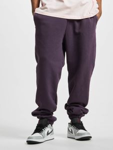 Pantalones versátiles de hombre URBAN CLASSICS con cordón ajustable y bolsillos, algodón de 460 g/m², color violeta.
