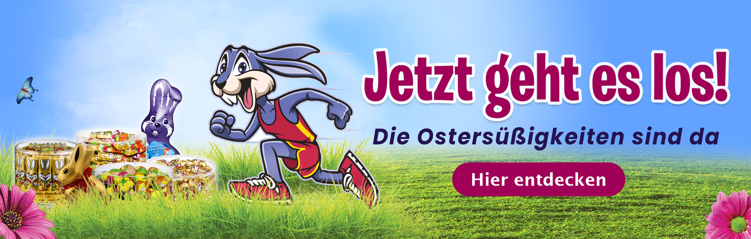 Es ist ein lila Hase zu sehen der läuft, verschieden Ostersüßßgikeiten liegen auf einer Wiese
