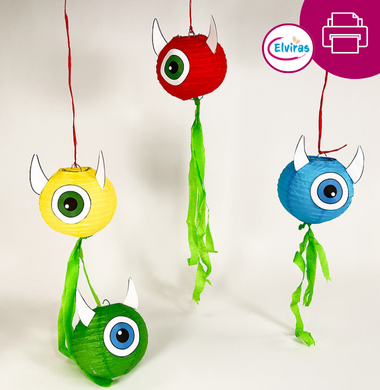 Lampion-Monster aus einem Laternen-Lampion, je einem großen Papier-Auge, Papierhörner und Krepppapier-Verzierungen.