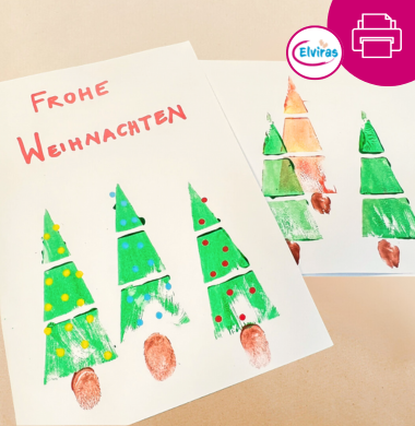 Weihnachtskarte. Das Motiv sind drei gedruckte Weihnachtsbäume, fpr die wir einen kostenlosen Basteldownload anbieten.