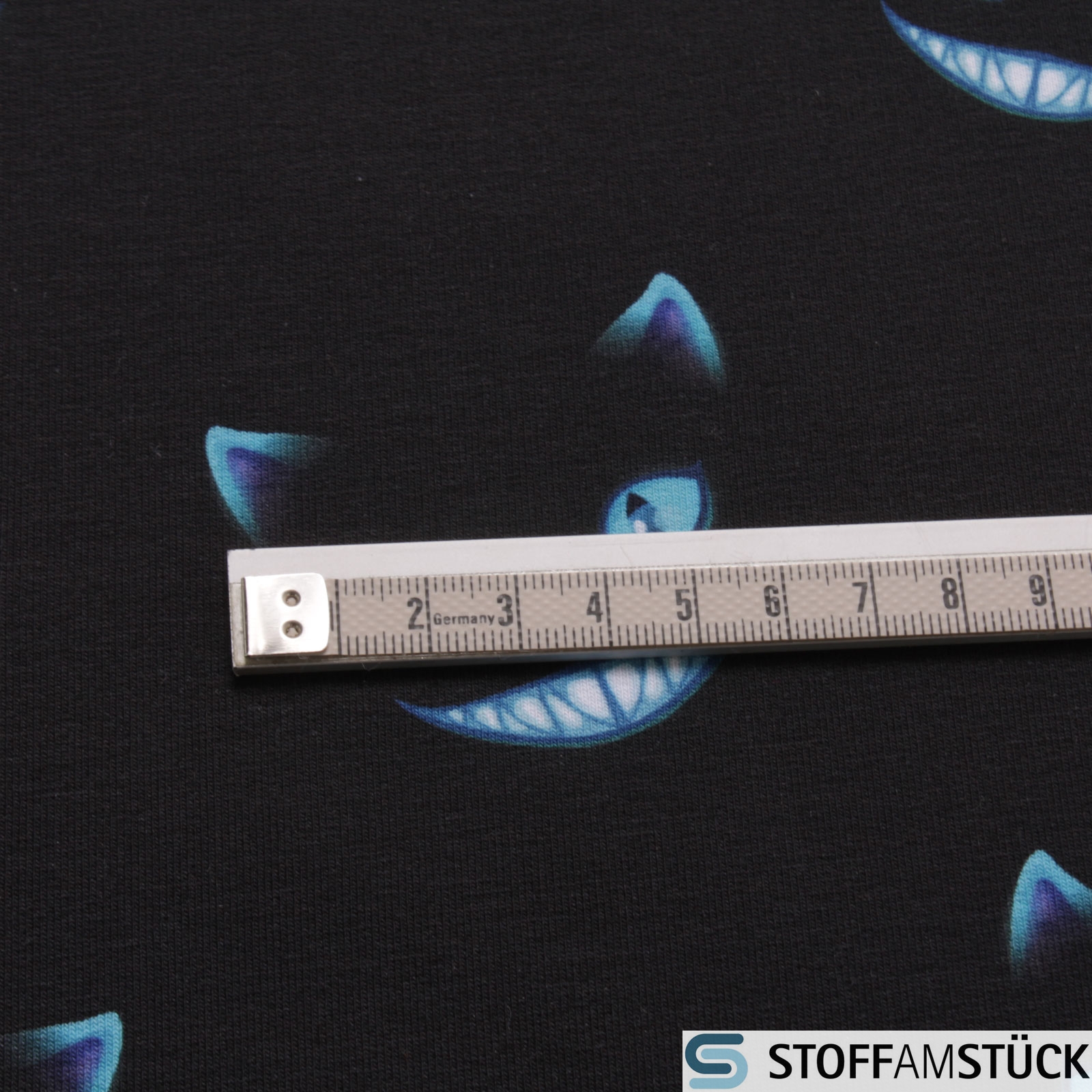 Baumwolle Elastan French Terry schwarz Grinsekatze blau Stoff