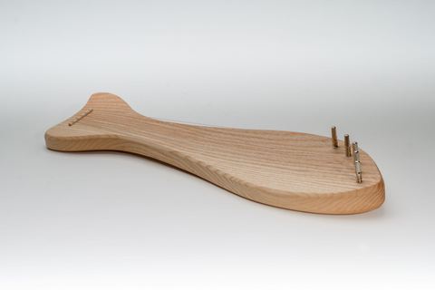 Lyre in ash, dolphin