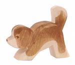 Die Ostheimer Bernhardiner kl. Kopf tief Ahorn ist eine kleine braun-beige Hundefigur von Ostheimer die aus Ahornholz gefertigt ist und mit erhobenem Schwanz steht.